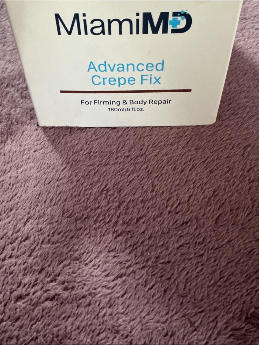 miami Advanced Crepe Fix Cream in White with Blue Accents